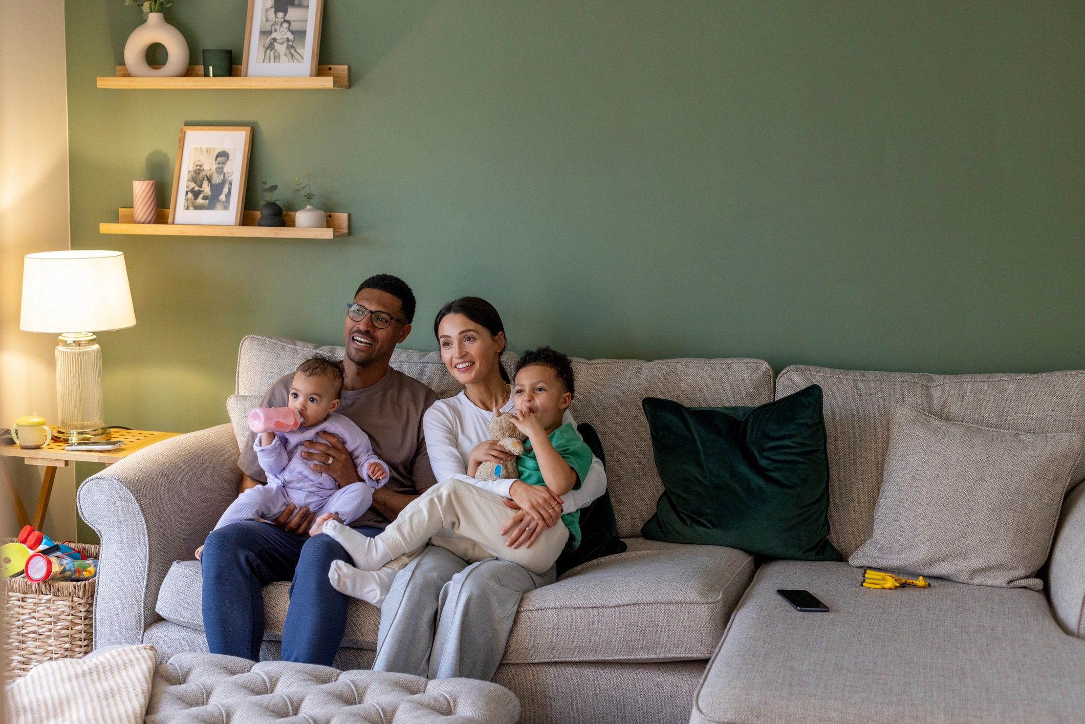Happy family relaxing together at home