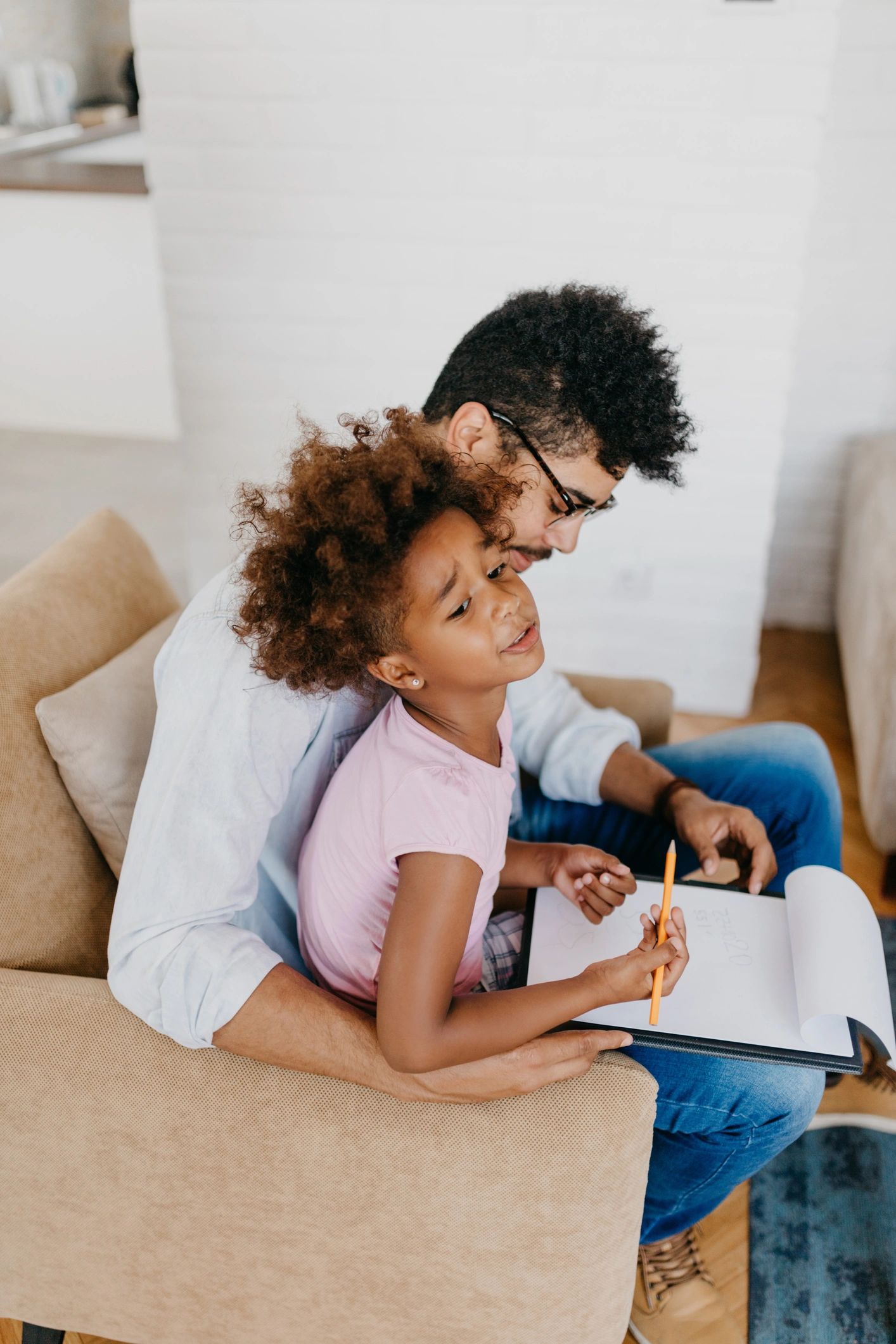 Father and daughter shopping online at home